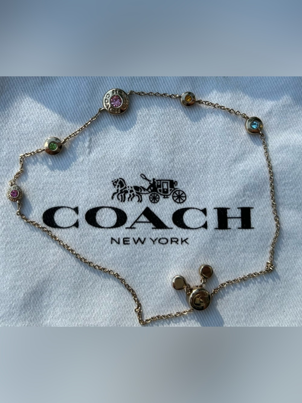 Coach Gold-Tone Station Bracelet with Pink, Green, Blue and Yellow Stones